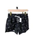 Black space character patterned swim shorts