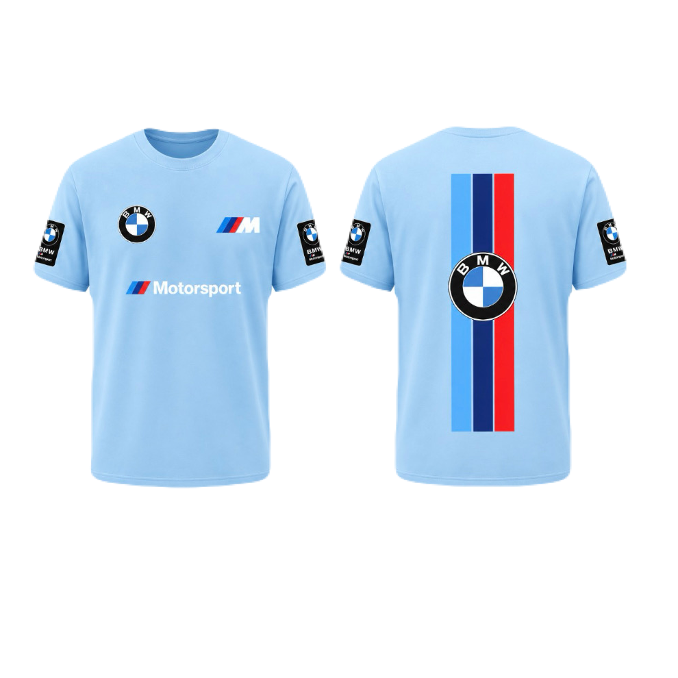 A light blue BMW Motorsport short-sleeve t-shirt shown from both the front and back. The front features the BMW roundel, an M logo, and 'Motorsport' text on the chest, with sleeve patches.