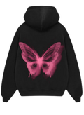 Black pullover hoodie shown from the front and back on a plain white background. The front has a small pink butterfly graphic on the left chest, and the back has a large pink butterfly graphic.