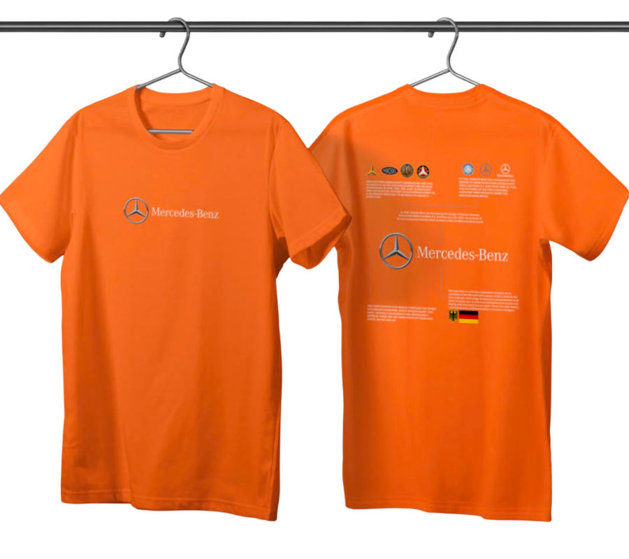 Two bright orange short-sleeve T-shirts hanging on metal hangers against a black background, showing the front and back designs. The front features a small Mercedes-Benz logo and text on the left chest, while the back has a larger Mercedes-Benz logo and multiple small printed icons and text blocks.