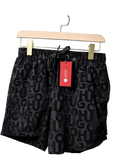 Black tonal letter pattern swim shorts
