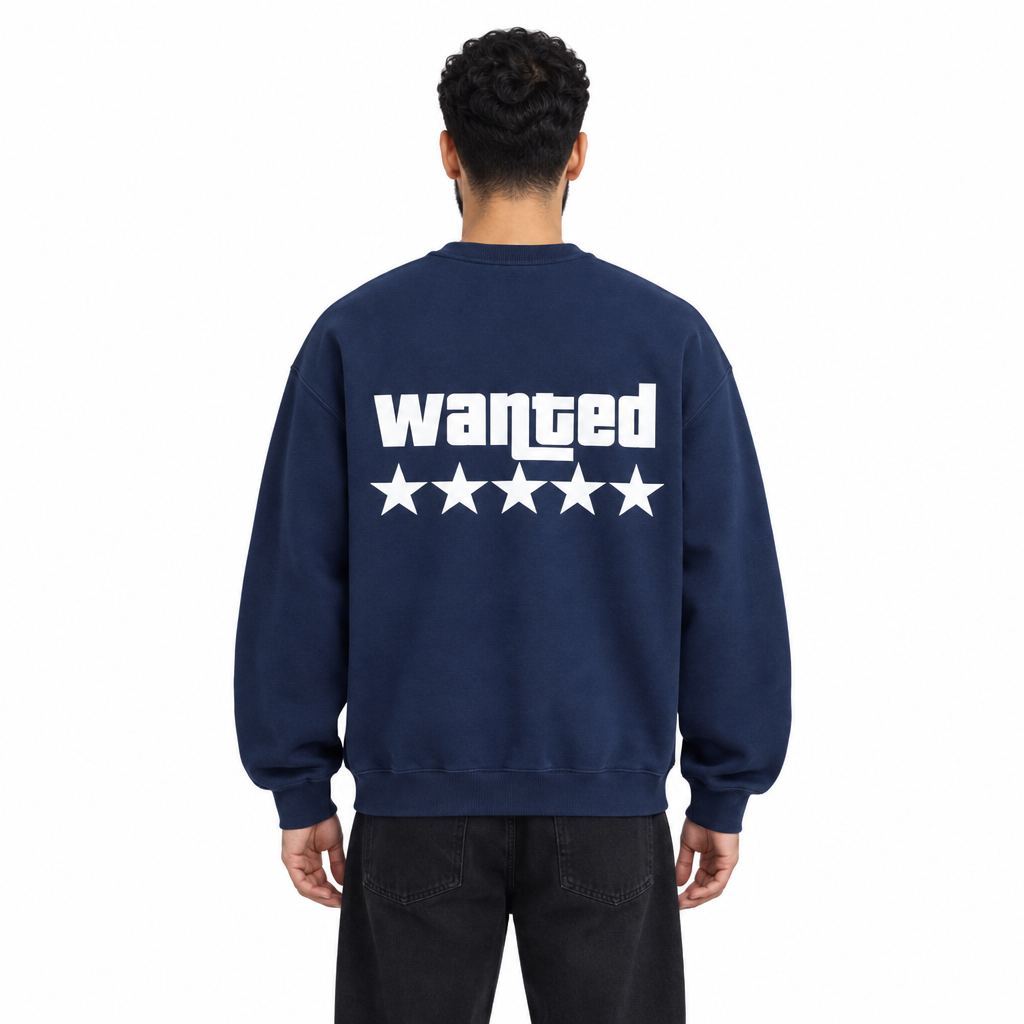 Back view of male model wearing the navy wanted sweater